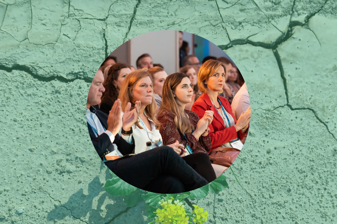 Photo of an audience clapping